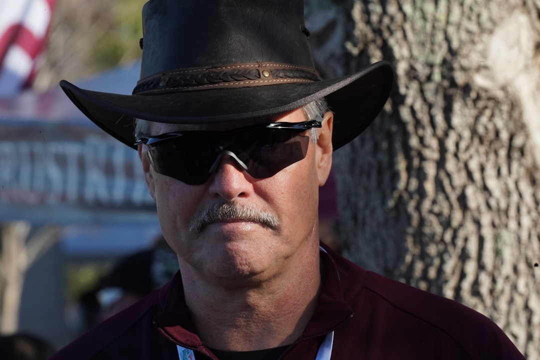 Former Michigan Coach Charged with Stalking, Invasion  